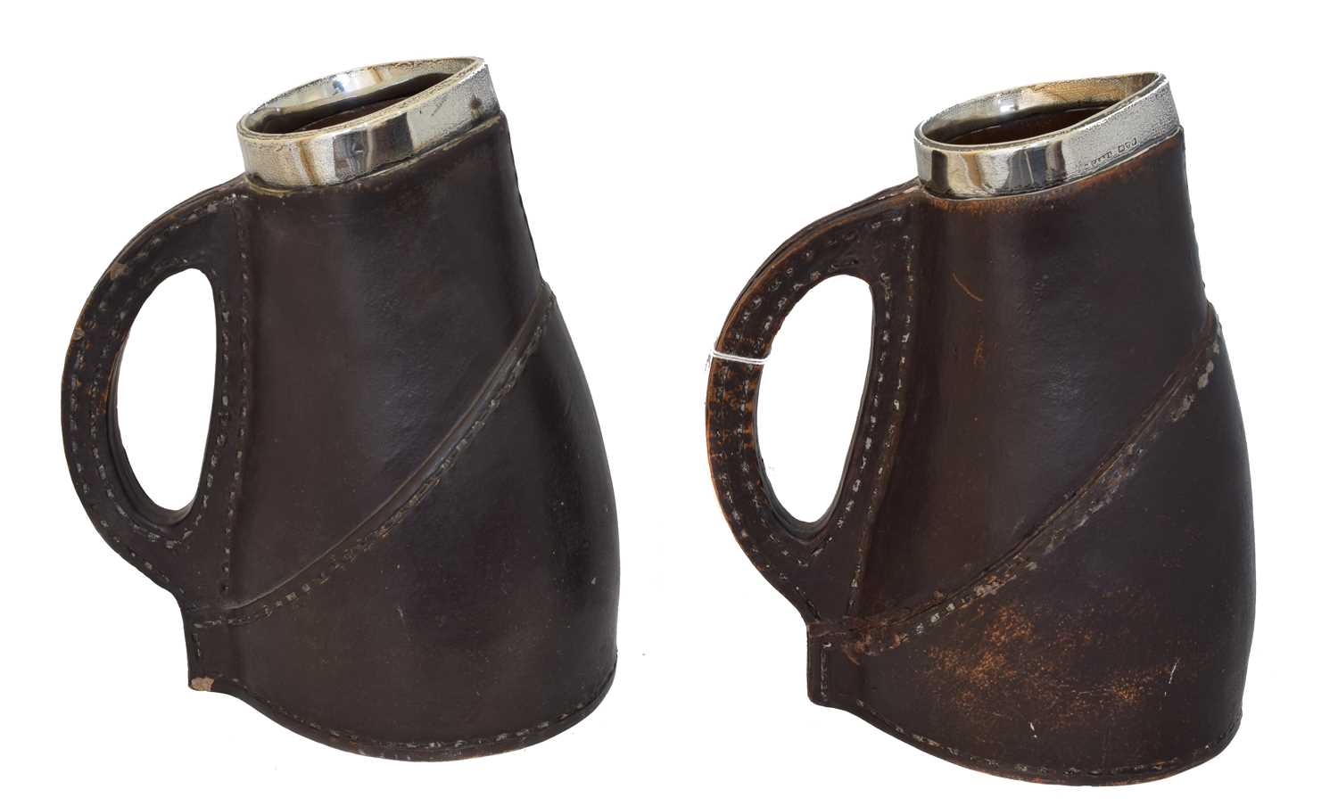 Lot 150 - Two silver topped Royal Doulton jugs