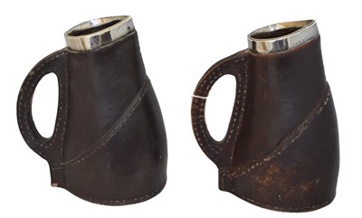 Lot 150 - Two silver topped Royal Doulton jugs