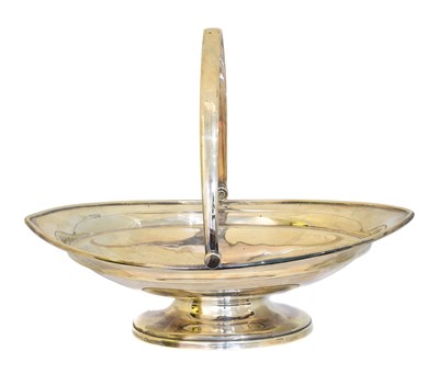 Lot 176 - A silver swing handled basket