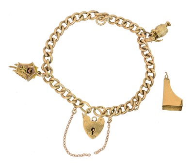 Lot 47 - A 9ct gold charm bracelet