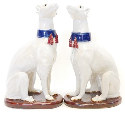 Lot 171 - Two Majolica greyhounds