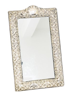 Lot 130 - An Edward VII silver fronted mirror