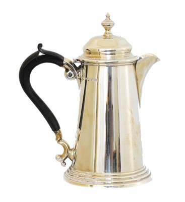 Lot 111 - A George V silver hot water jug