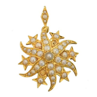 Lot 14 - An early 20th century split pearl brooch