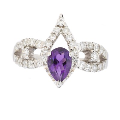 Lot 165 - An amethyst and diamond dress ring