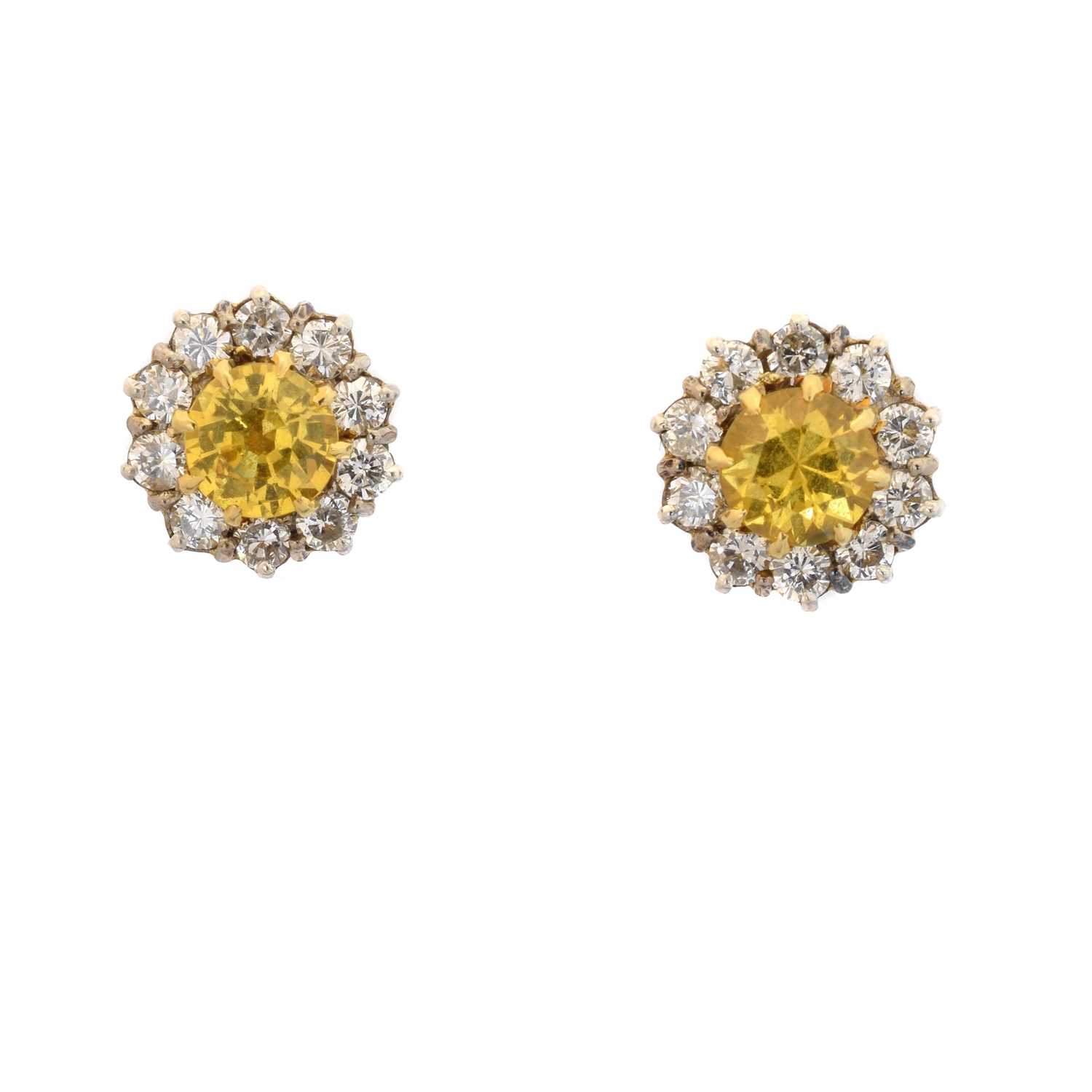 Lot 60 - A pair of sapphire and diamond earrings by Alabaster & Wilson