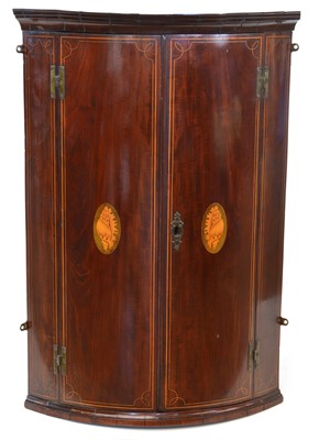 Lot 343 - George III mahogany Bow Front Corner Cupboard