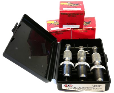 Lot 587 - 40-82 WCF cases and a die set.
