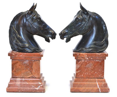 Lot 84 - Two Bronze Horse Heads on Marble Plinths