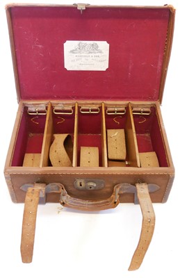 Lot 530 - Leather and canvas cartridge magazine labelled Mortimer and Son Edinburgh