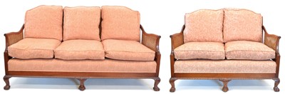 Lot 269 - Two Reproduction Walnut Framed Bergere Sofas