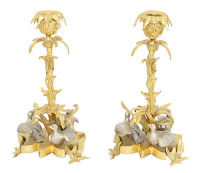 Lot 83 - A pair of candlesticks