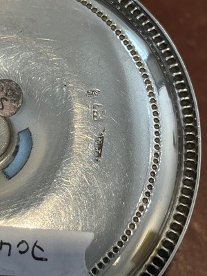 Lot 16 - A George III silver miniature chamber stick