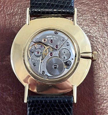 Lot 230 - A 1970s 18ct gold Universal Genève manual wind wristwatch