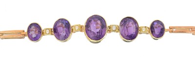 Lot 40 - An early 20th century amethyst and split pearl bracelet