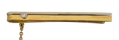 Lot 27 - An 18ct gold diamond tie slide