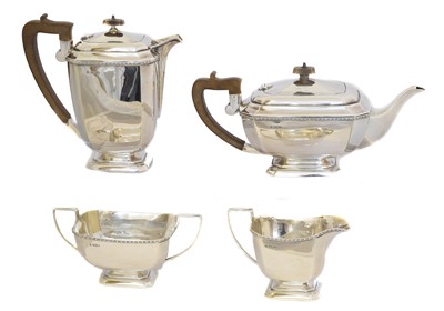 Lot 126 - A George VI silver four piece tea set