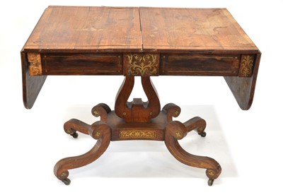 Lot 336 - Regency rosewood and brass inlaid sofa table