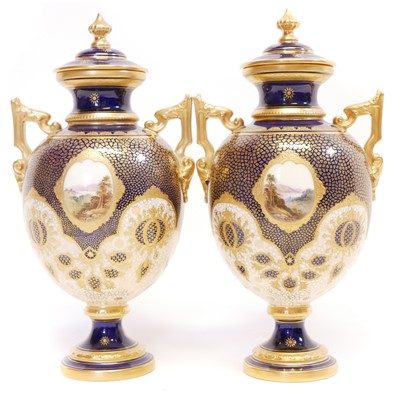 Lot 153 - Pair of Coalport twin handled lidded vases