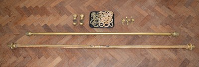 Lot 212 - Two giltwood curtain poles