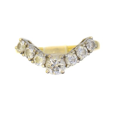 Lot 138 - An 18ct gold diamond band ring