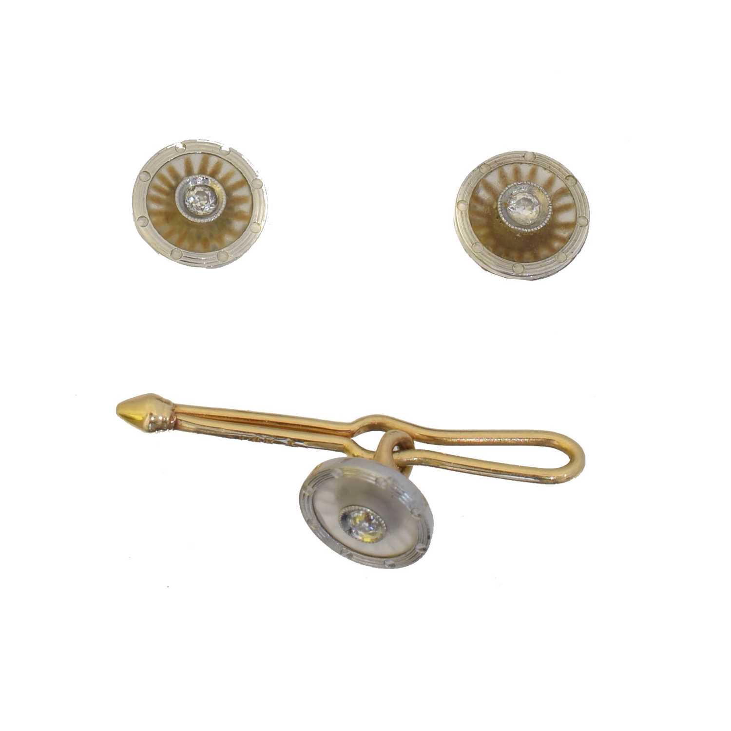 Lot 27 - A rock crystal and diamond dress stud