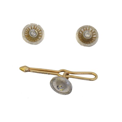 Lot 27 - A rock crystal and diamond dress stud