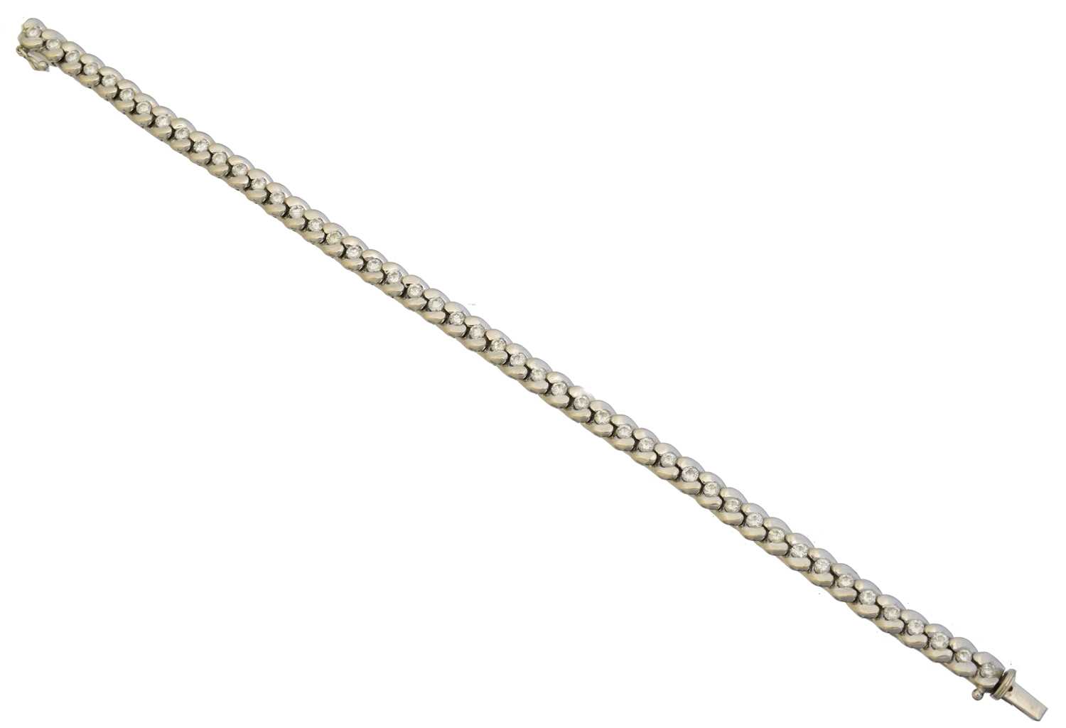 Lot 24 - An 18ct gold diamond line bracelet