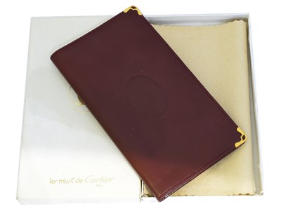 Lot 13 - A Must De Cartier 'Bordeaux' wallet