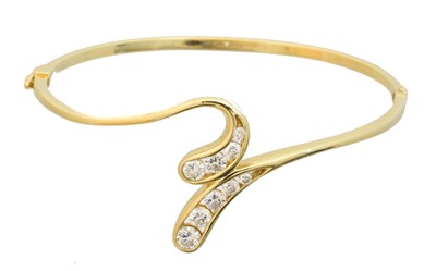 Lot 31 - An 18ct gold diamond bangle by David M Robinson