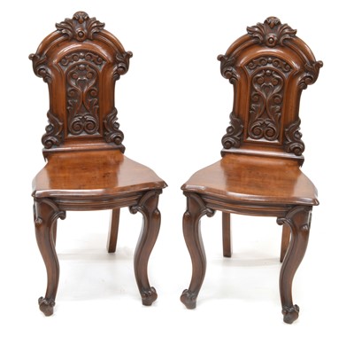 Lot 276 - Pair of Victorian mahogany hall chairs