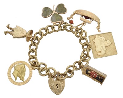 Lot 37 - A 9ct gold charm bracelet.