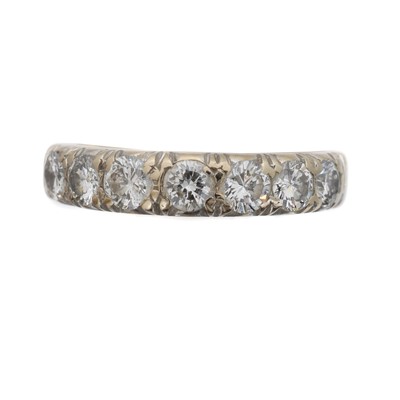 Lot 96 - A diamond band ring by Boodle & Dunthorne.