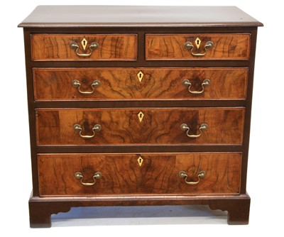 Lot 362 - George III style walnut chest of drawers