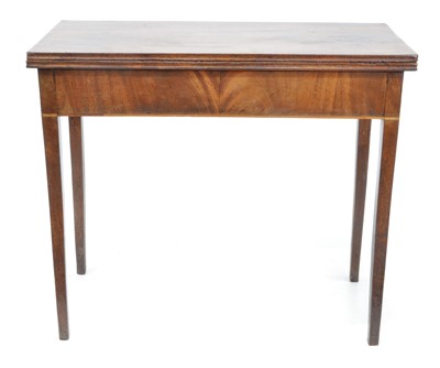 Lot 317 - George III mahogany fold-over tea table