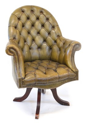 Lot 337 - Mid 20th century green leather Chesterfield swivel office chair