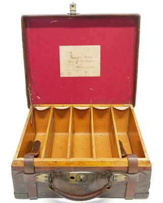 Lot 496 - Oak and leather cartridge magazine by Wanless...
