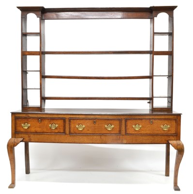 Lot 298 - George III oak and mahogany cross-banded dresser