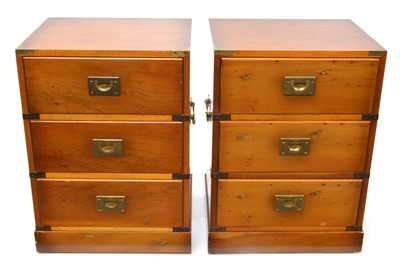 Lot 310 - Pair of modern yew and brass mounted campaign style bedside chests