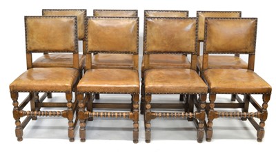 Lot 279 - Eight early 20th century leather upholstered dining chairs