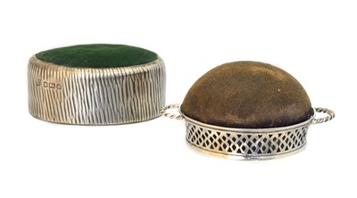 Lot 210 - Two silver pin cushions
