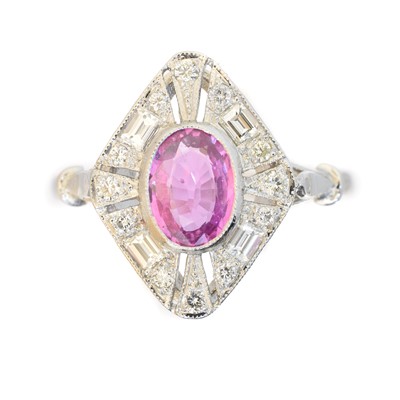 Lot 95 - A sapphire and diamond cluster ring