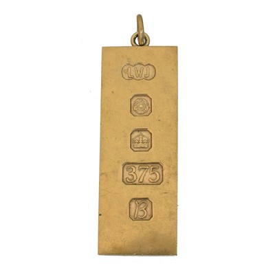 Lot 54 - A 9ct gold ingot
