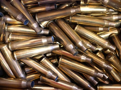 Lot 592 - Seventy two .338 Lapua Magnum rifle cases, by...