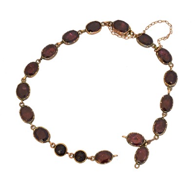 Lot 13 - A 19th century foil back garnet bracelet