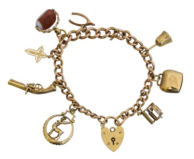 Lot 27 - A 9ct gold charm bracelet