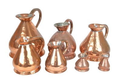 Lot 290 - Seven Graduated Copper Measuring Jugs