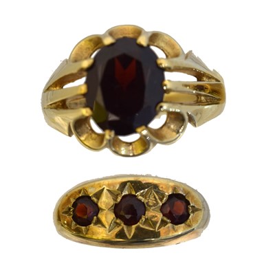Lot 85 - Two 9ct gold garnet dress rings