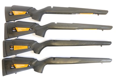 Lot 523 - Four Tikka T3 black synthetic stocks, three...