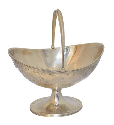 Lot 141 - A Victorian silver swing handled sugar bowl